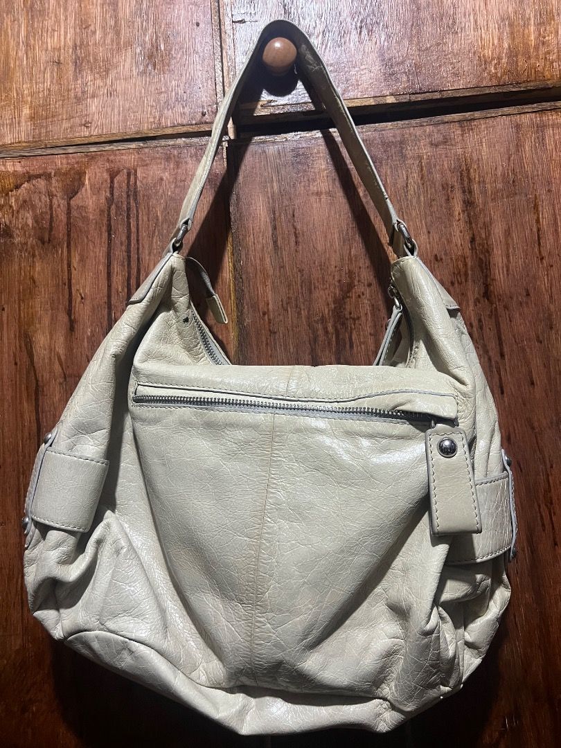 NIKI JODI HOBO APPLE GREEN (Category: Shoulder Bags) located in San Pedro. Submitted by zllerrzz (Listing ID 1385570738, Image 2). Description: Has minor stains but still very pretty.