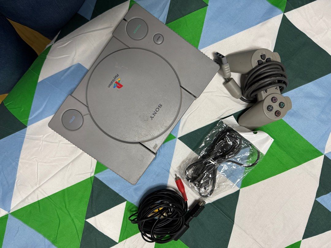 SONY PLAYSTATION 1 (SET), PLAYSTATION 2 CONTROLLER (Category: PlayStation) located in San Fernando. Submitted by donnamr (Listing ID 1385486764, Image 3). Description: Hello! Selling one of my collections :( - AS SET: Playstation 1, with 1 controller (out as untested since binili ko to for display sana, with wires, good physical condition, walang malagkit) - Controller of Playstation 2 RFS: Need funds, moving out and decluttering MOP: LBC COP/GCA