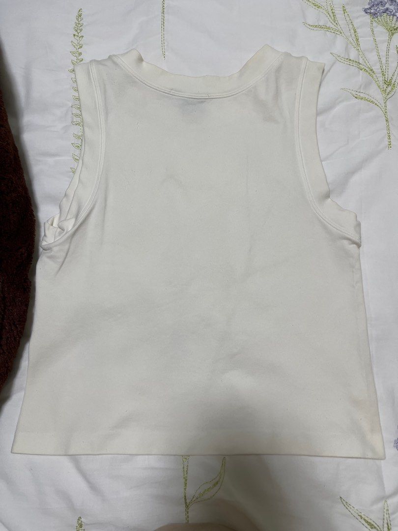 White basic tank top (Category: Sleeveless) located in Singapore. Submitted by bronzel27 (Listing ID 1385555035, Image 3). Description: Basic white tank top Staple piece light stretchy material, super good quality can fit UK4-8 #white #tanktop #basic .