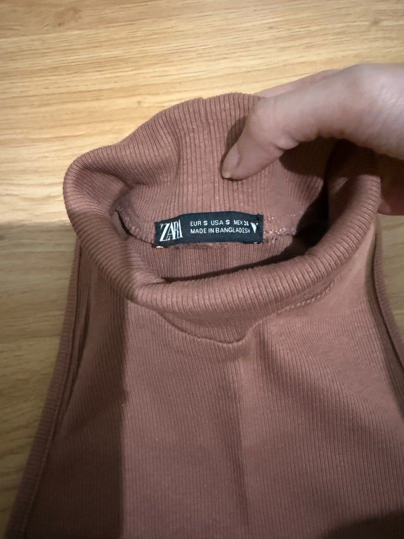 Zara Ribbed Turtleneck (Category: Sleeveless) located in Davao. Submitted by thearchiveedit (Listing ID 1385582910, Image 2). Description: - No “when worn” requests Seller’s measurements: 5’2, 41kg, 32-24-32. Bottoms are tailored to fit seller. - No lowballing - No joy reservers - Most items are in pristine condition(barely used, used once) - All items are guaranteed AUTHENTIC.