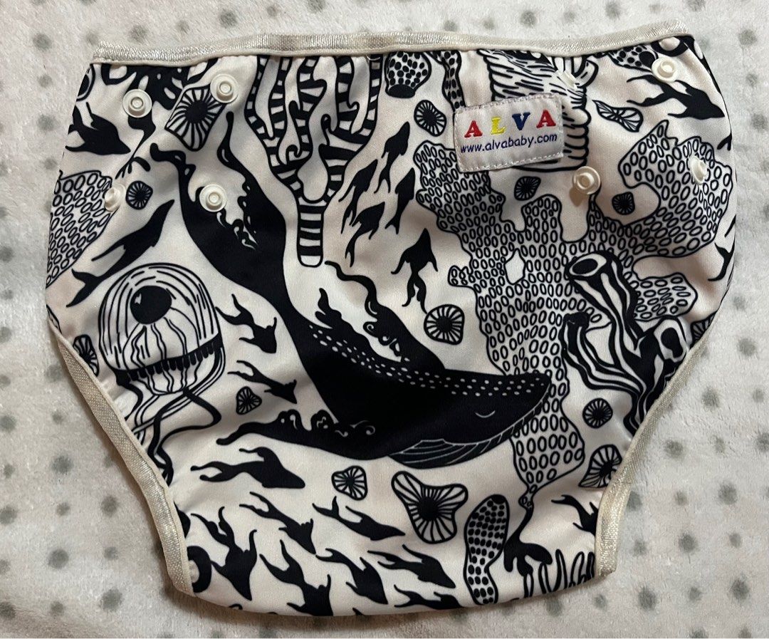 Alva cloth diaper 0-12 months (Category: Babies & Kids Fashion) located in Mandaluyong City. Submitted by jogscloset (Listing ID 1385753892, Image 2). Description: Foot print - 200 Black and white - 200 Take all 350 Note: - can fit newborn babies - can be used for swimming - in very good condition - no insert.