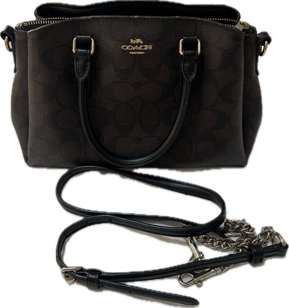 Authentic Coach black/brown mini caryall (Category: Luxury Bags & Wallets) located in Makati City. Submitted by gedjie (Listing ID 1385618881, Image 1). Description: .