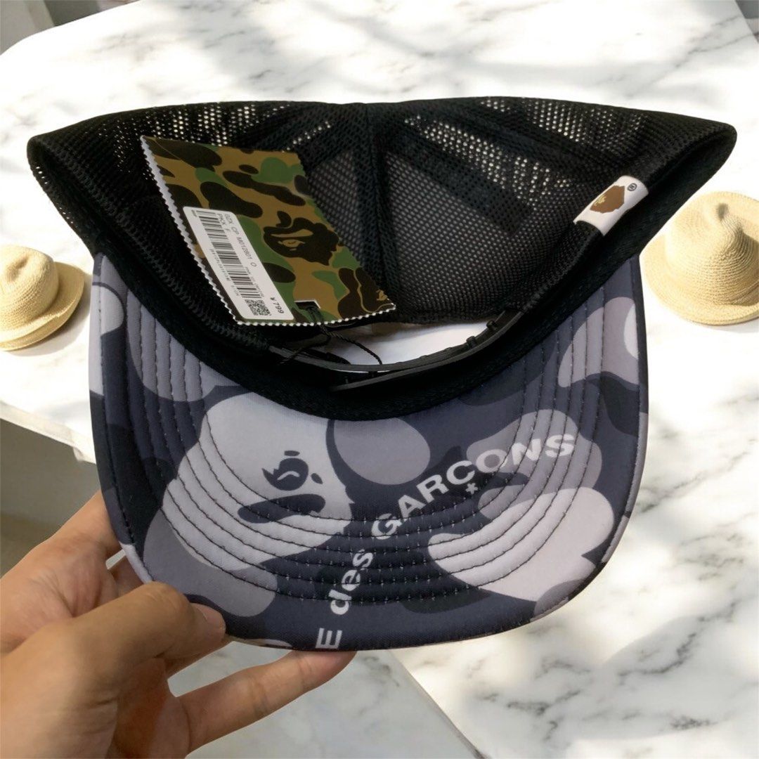 BAPE X CDG TRUCKER CAP (Category: Caps & Hats) located in Manila. Submitted by scarlett_hope (Listing ID 1385773917, Image 2). Description: BAPE X CDG TRUCKER CAP 1 SIZE FITS ALL COLOR RATE: 10/10 CONDITION: BRAND NEW MOP: GCASH COURIER: J&T.