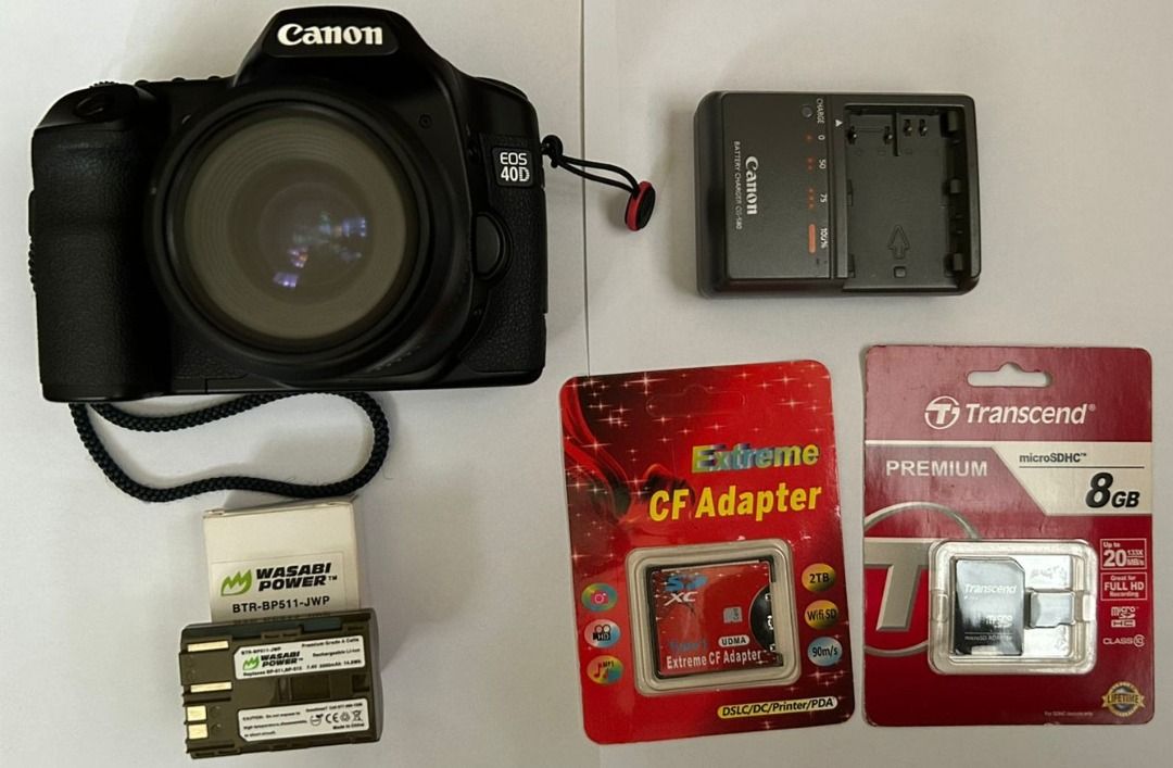 Canon EOS 40D DSLR Digital Camera Digicam (Category: Cameras) located in Arayat. Submitted by josepdg (Listing ID 1385708372, Image 2). Description: 10.1MP Digital SLR Camera with Live View (No Video mode). Made in Japan. What's Included; -Camera with 35-70mm Canon Zoom lens. -Battery -SD to CF Adapter + an 8GB SD Card -Original Charger *This is a used item so please expect some scratches, scuffs, and imperfections on the camera body. ISSUE: -Int