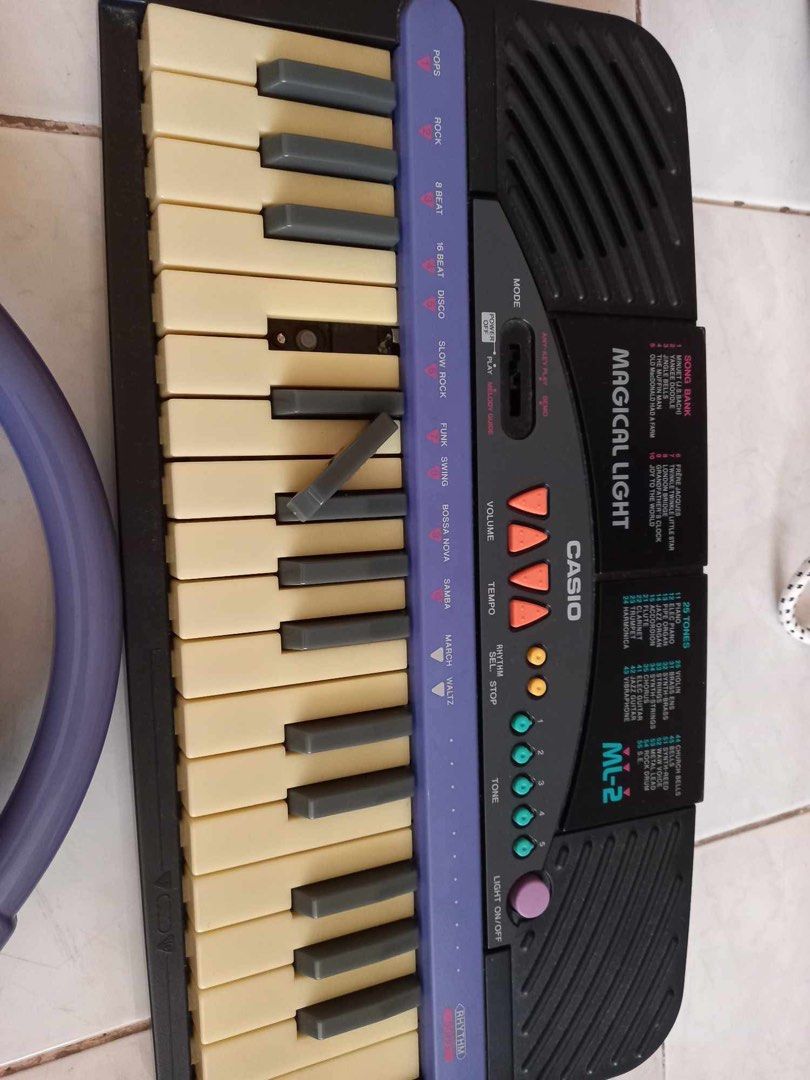 Casio portable piano (Category: Musical Instruments) located in Naga. Submitted by happeemarket (Listing ID 1385689672, Image 2). Description: Working kahit tanggal na ungbisang black tiles na dididkit lang po.