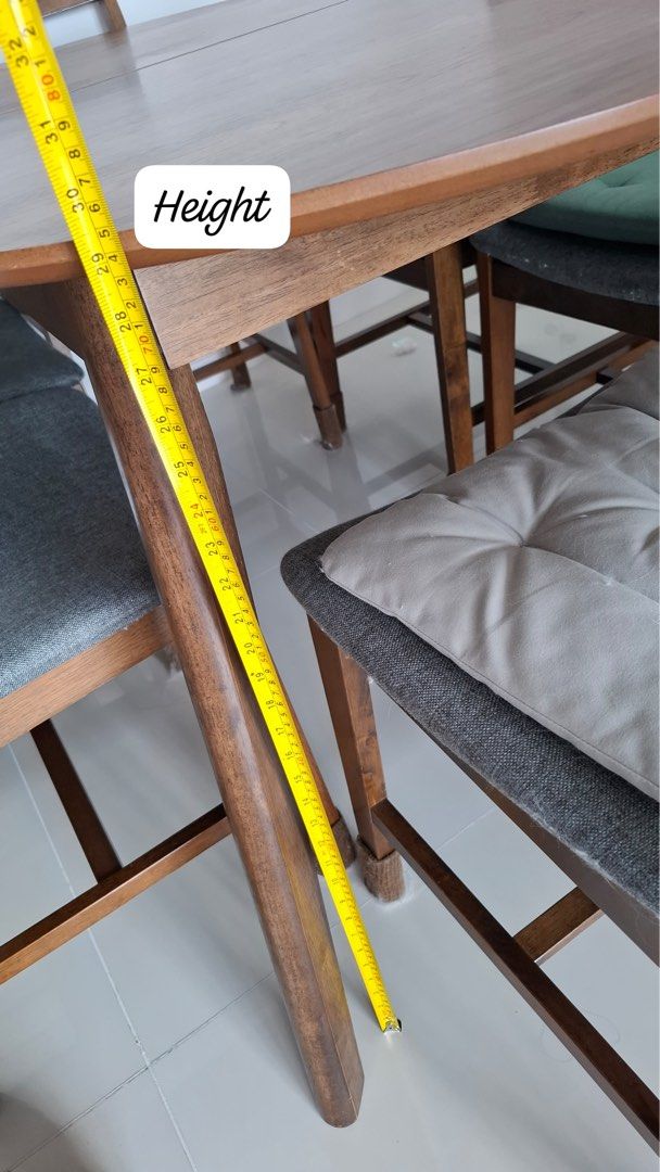 Extendable dining table (Category: Tables & Sets) located in Singapore. Submitted by jmnist (Listing ID 1385779712, Image 2). Description: Extendable wooden dining table. 150cm when not extended and can extend to 180cm long. Oval shape. Arrange your own transport and movers to self collect at parkland residences only. Just need to put both ends and middle part will have the extended part to lift up. Dining table only without chairs. Chair will be