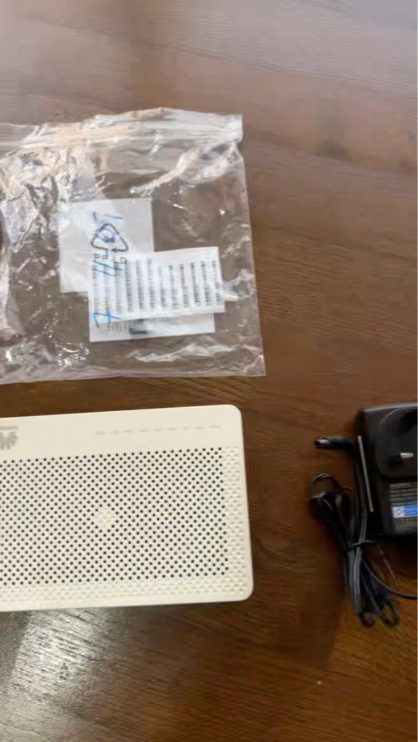Fiber Optic Cable (Category: Cables & Adaptors) located in Singapore. Submitted by quasar8888 (Listing ID 1385642662, Image 1). Description: Lightly used Huawei HG8240H5 GPON Terminal.