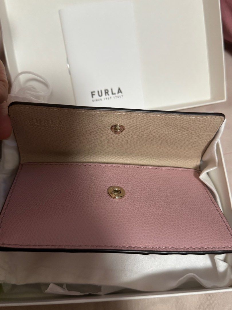Furla Card Wallet Pink (Category: Luxury Bags & Wallets) located in Quezon City. Submitted by kmaeb (Listing ID 1385794476, Image 2). Description: Barely used Complete with box, dustbag and tags Can fit up to 5 cards 2 main compartment (flap and zipper) - can fit other cards and cash SF shouldered by buyer.
