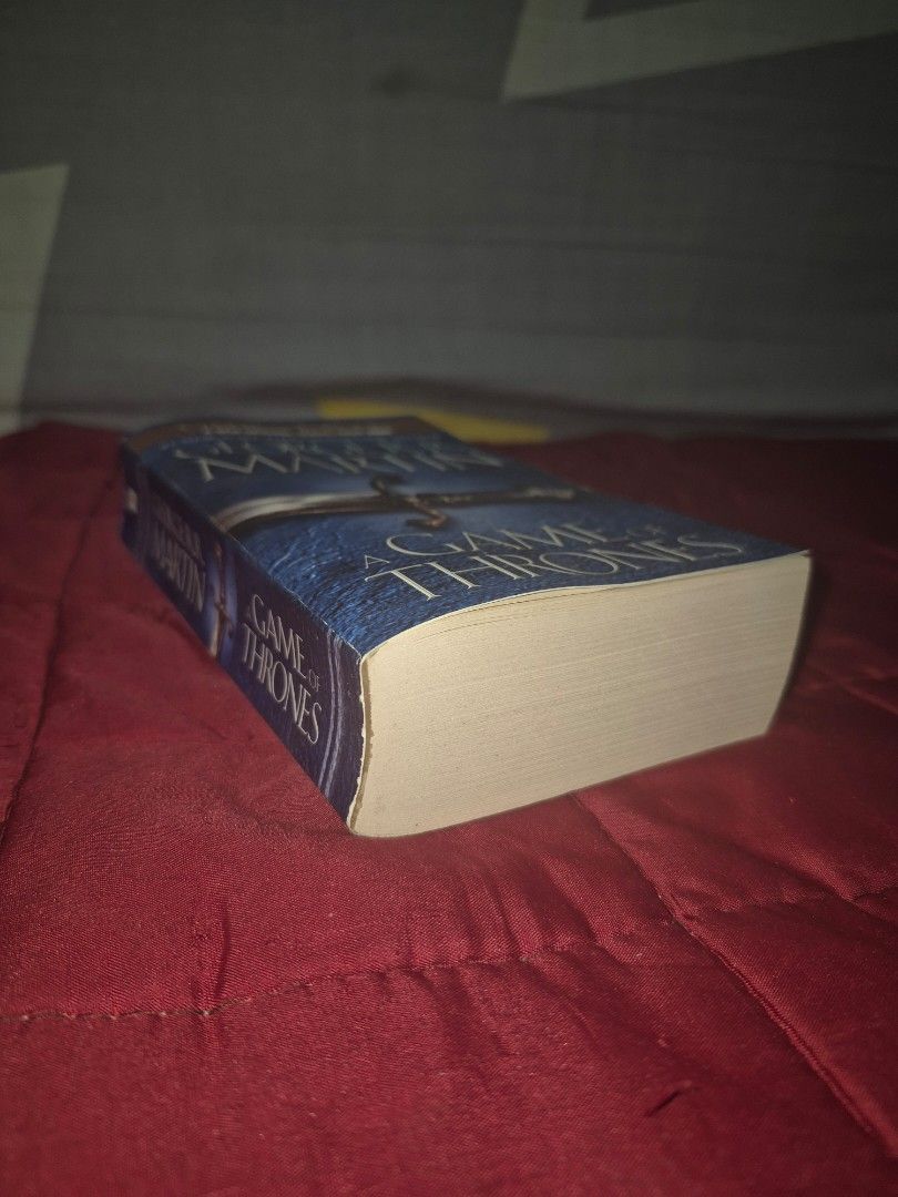 GOT - Game of Thrones (Category: Storybooks) located in Taguig. Submitted by dsrmrf (Listing ID 1385743173, Image 2). Description: AUTHENTIC BOOK A Game of Thrones (Like new) - 400 • in good condition • has no yellow stains • no spine crease MOP: Gcash/Unionbank/Seabank MOD: Lalamove/Gcash pm me for more photos 🤗.