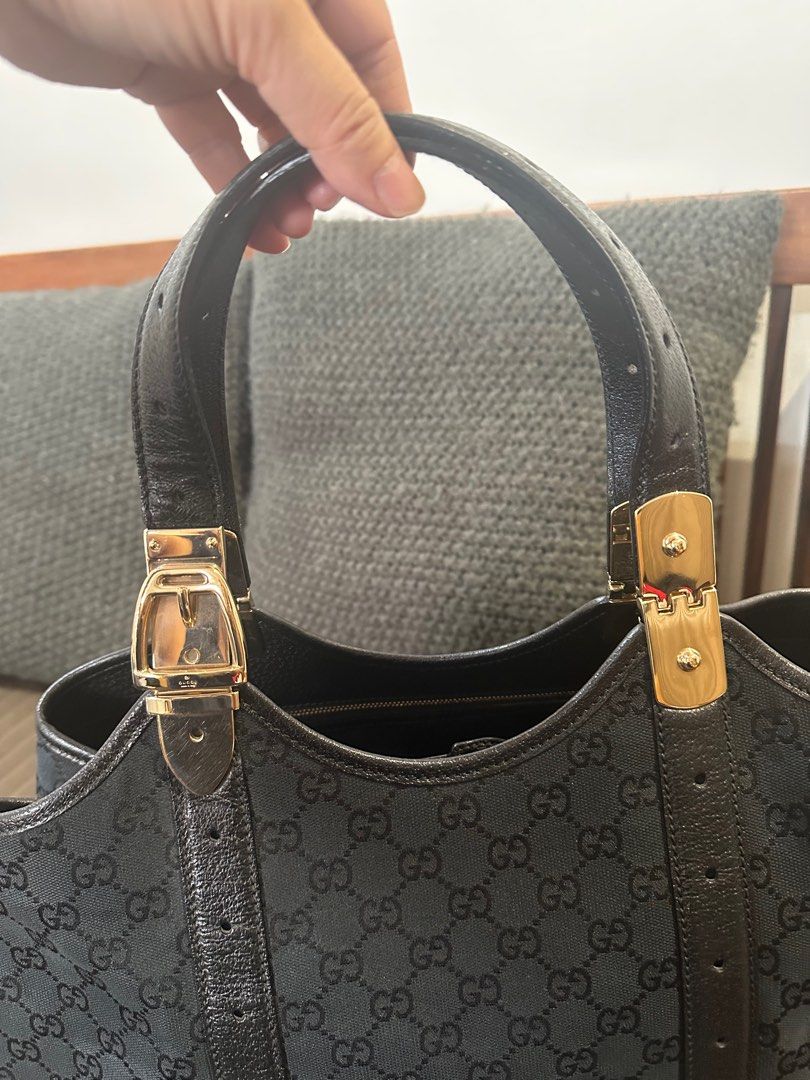 Gucci Horsebit Canvass Tote (layaway ok) (Category: Luxury Bags & Wallets) located in Muntinlupa City. Submitted by onemanila (Listing ID 1385642877, Image 3). Description: Nice bag for everyday and for office. It fits and 13” macbook plus all your essentials and still look slim. The handle comes with movable metal hardware so the leather handle will not crease. Inside is clean. Light scratch at the bottom of the bag. Size is 18”x 22”x4.5”.