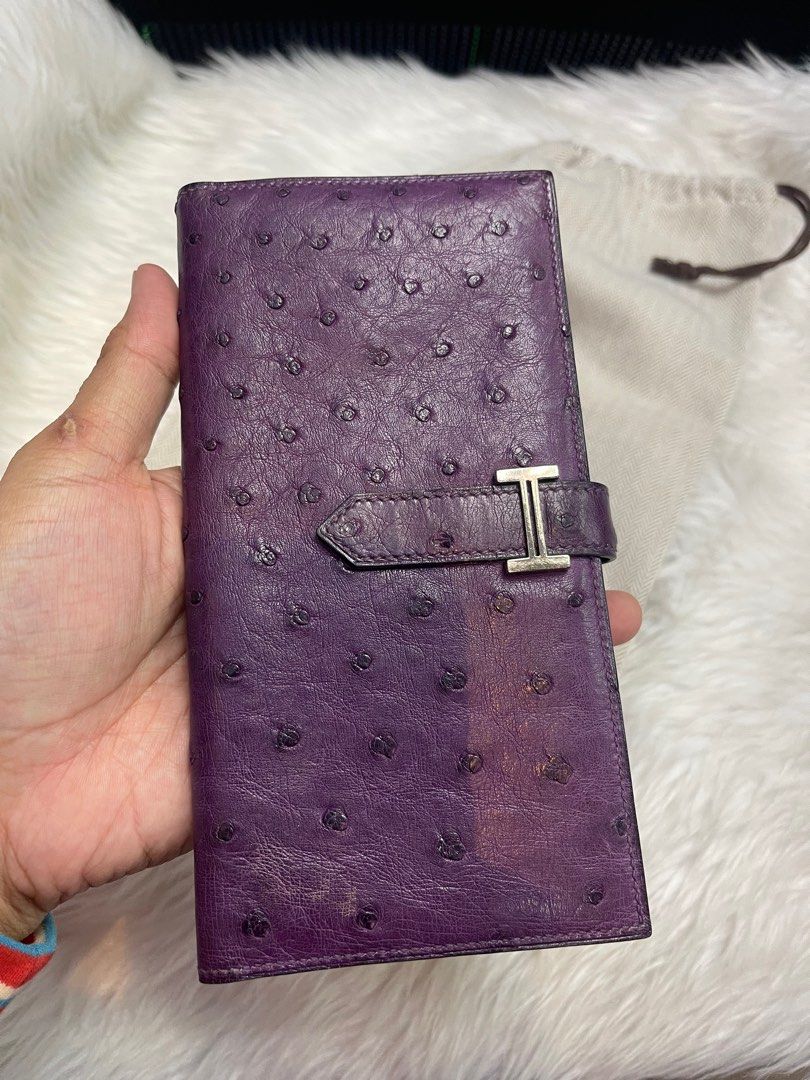 HERMES Violine Ostrich Leather Bearn Wallet (Category: Luxury Bags & Wallets) located in Taguig. Submitted by mluxeph (Listing ID 1385649759, Image 2). Description: HERMES Violine Ostrich Leather Bearn Wallet Gender: Ladies’ Material: Ostrich Leather Stamp: Square N Year: 2010 Interior: Five Card Slots, Three Bill Pockets, One Gusseted Open Pocket and One Zipper Pocket Measurements: 6.9”L X 0.5”W X 3.5”H Hardware: Palladium Inclusions: Original D