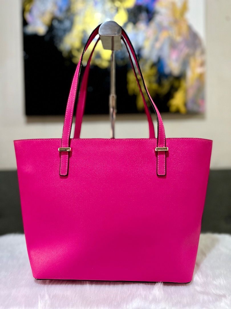 KATE SPADE Clearance Sale ❗️ (Category: Luxury Bags & Wallets) located in Leyte. Submitted by geojhen944614 (Listing ID 1385651390, Image 3). Description: ✨Kate Spade New York Saffiano Leather Tote in vibrant hot pink. Crafted from durable cross-grain Saffiano leather with gold-tone hardware, this structured tote offers both elegance and practicality. Preloved and well-maintained, ready for continued use.” 💼 Material: Saffiano Leather 🎯 Conditi