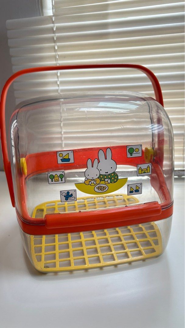 Miffy Storage container (Category: Storage Boxes & Baskets) located in Kuala Lumpur. Submitted by hanabanana21 (Listing ID 1385645072, Image 1). Description: ✨Miffy storage for baby bottles and other items such as bread or non food items as well ✨Well used, have slight scratches and stains ✨ Size measurements: 24 cm L x 24 cm W x 24 cm H 29 cm L when include handle 30 cm H when include handle ✨ Please allow difference of 1 to 2 cm from the stated