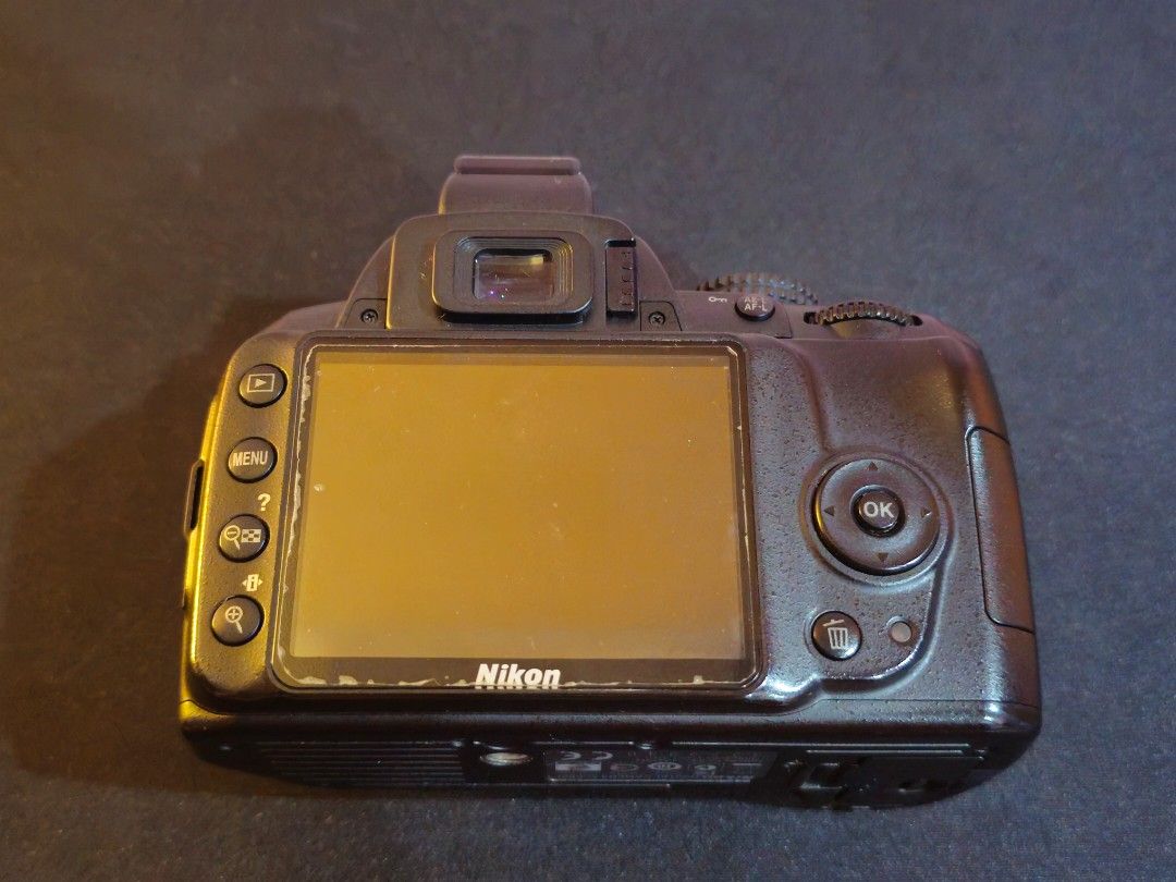 Nikon D3000 + 18–55 mm Lens + SUNPAK RD2000 (Category: Cameras) located in Manila. Submitted by annix_d (Listing ID 1385755143, Image 3). Description: Camera + Lens • Image quality and maneuvering - good, no issues • Great for beginners • Minor scratches on exposed parts • Issue: Heavy vignette on digital screen (last photo) SUNPAK RD2000 (Flash) • Never used • + user manual Add’l items • Camera bag • Camera strap • Quick charger • User manuals •