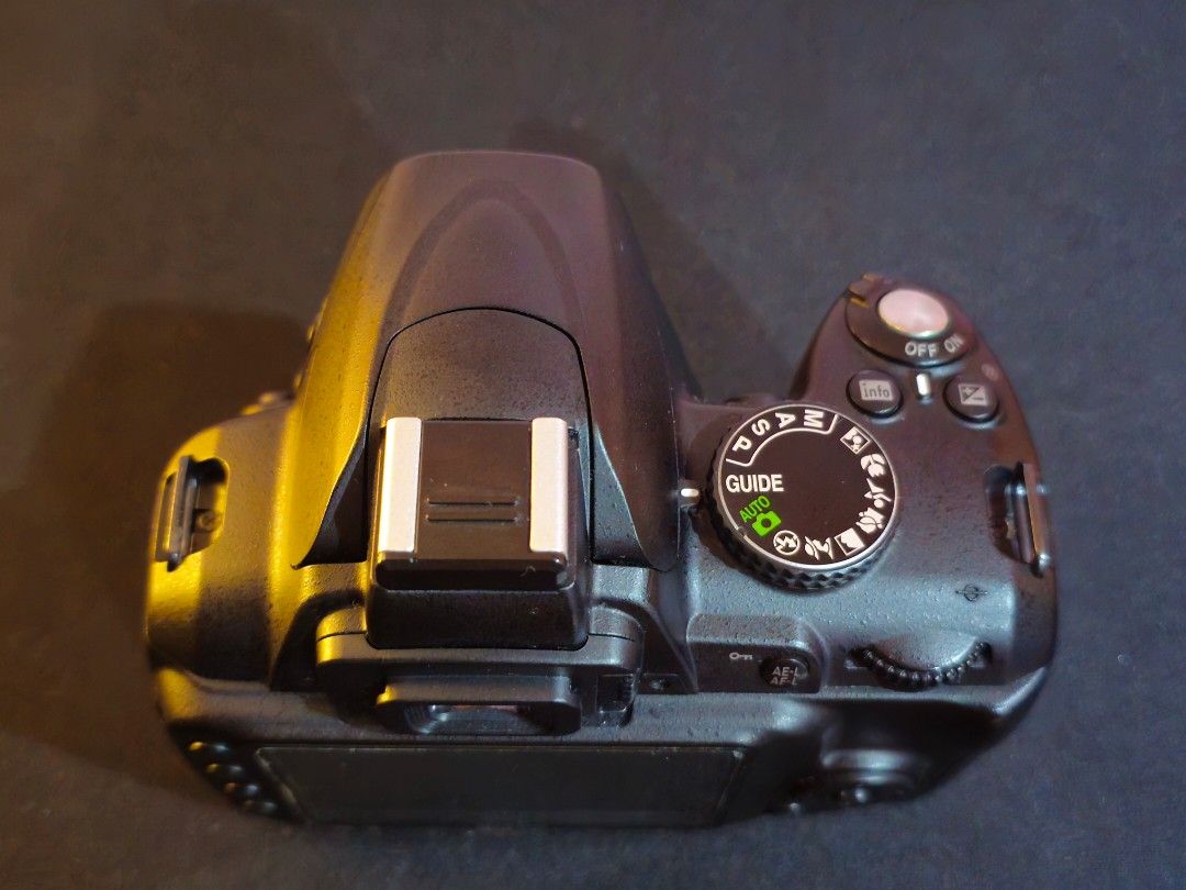 Nikon D3000 + 18–55 mm Lens + SUNPAK RD2000 (Category: Cameras) located in Manila. Submitted by annix_d (Listing ID 1385755143, Image 2). Description: Camera + Lens • Image quality and maneuvering - good, no issues • Great for beginners • Minor scratches on exposed parts • Issue: Heavy vignette on digital screen (last photo) SUNPAK RD2000 (Flash) • Never used • + user manual Add’l items • Camera bag • Camera strap • Quick charger • User manuals •