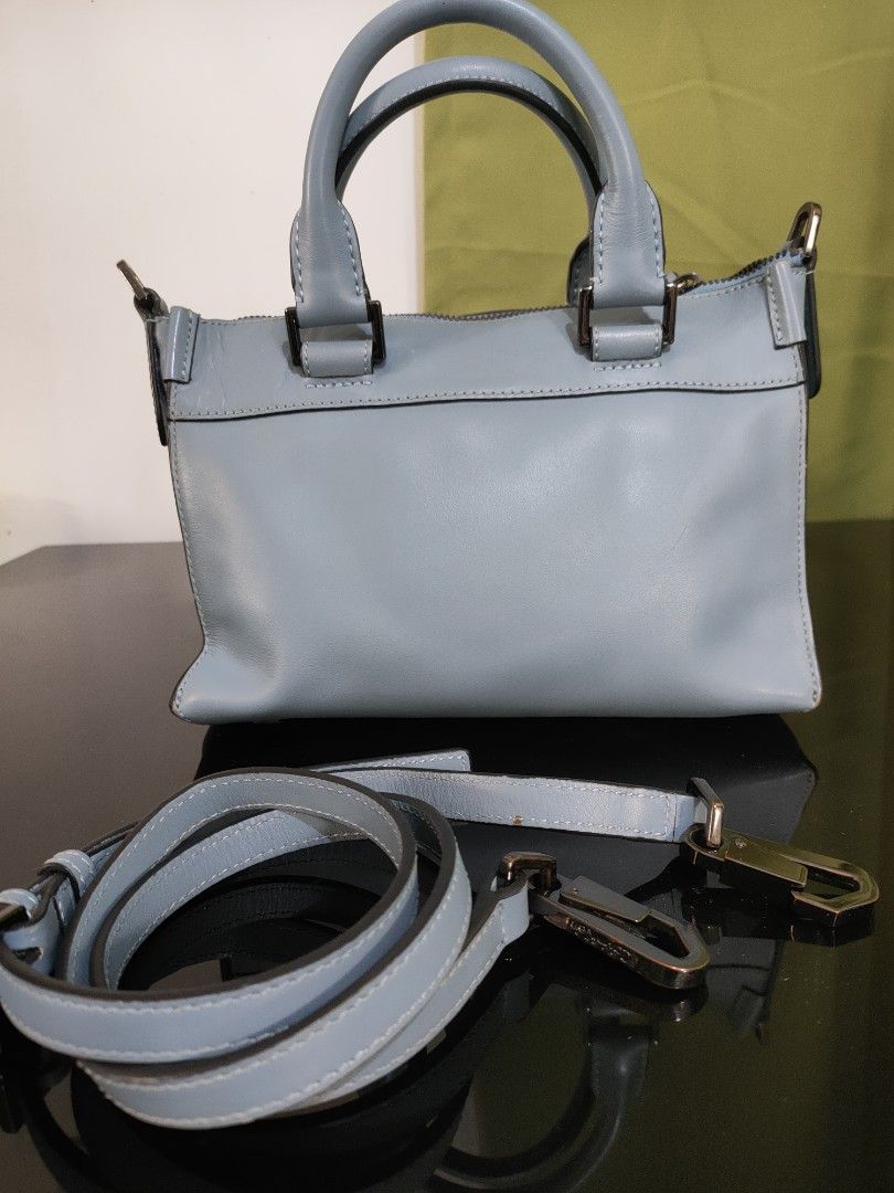 Preloved Calvin Klein mini blue bag (Category: Luxury Bags & Wallets) located in Marikina City. Submitted by kiara1986edsa (Listing ID 1385682221, Image 2). Description: Calvin Klein mini blue bag All our bags are bought in Japan preloved bag stores ONLY 1 FLAW - there's a micro brown dot on the strap as shown in the first image. gun metal hardware no rust Lightly used adjustable strap No dust bag No authentication papers Gcash/BDO/BPI Lalamove M