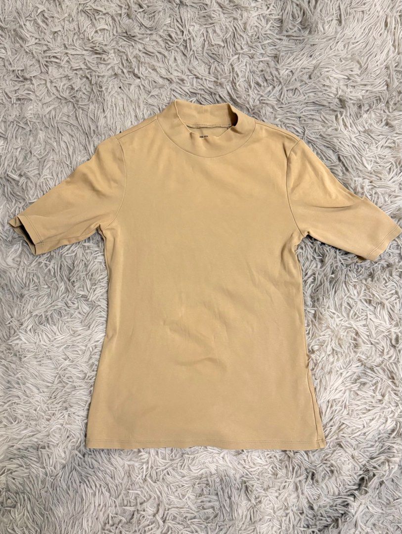 UNIQLO NUDE RIBBED TURTLE NECK (Category: Others Tops) located in Manila. Submitted by mnldstr (Listing ID 1385748913, Image 1). Description: .