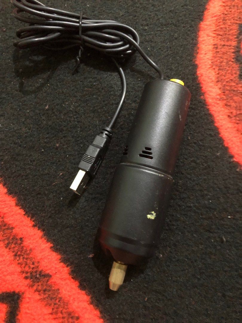 USB powered electric hand drill (Category: Construction Tools & Equipment) located in Quezon City. Submitted by markgolveo (Listing ID 1385798728, Image 2). Description: USB powered electric hand drill Unit only no tips included Tested working properly .