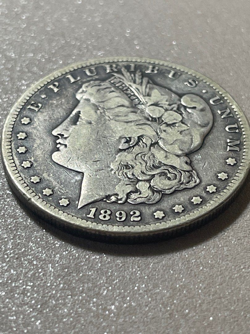 A13 1892 CC Morgan Dollar key date (Category: Currency) located in Antipolo. Submitted by treasure.keeper (Listing ID 1390069570, Image 1). Description: 1892 cc 1 Morgan Dollar keydate one of the Rarest! With ita finest .9 silver. I made 2 kinds of pictures shot one with lights and none tbw other .