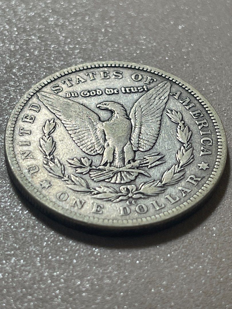A13 1892 CC Morgan Dollar key date (Category: Currency) located in Antipolo. Submitted by treasure.keeper (Listing ID 1390069570, Image 2). Description: 1892 cc 1 Morgan Dollar keydate one of the Rarest! With ita finest .9 silver. I made 2 kinds of pictures shot one with lights and none tbw other .