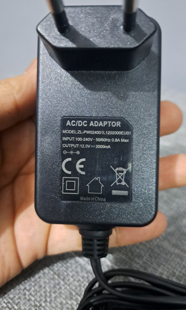 AC/DC adaptor (Category: Electrical, Adaptors & Sockets) located in Quezon City. Submitted by kirstenbella (Listing ID 1390153013, Image 2). Description: AC/DC adaptor *​Model: ZL-PW024001L1202000EU01 *​Input: 100-240V, 50/60Hz, 0.8A Max *​Output: 12.0V, 2000mA (2A) *​Plug Type: European (two-round pins) *​Connector: A cylindrical (barrel) plug *Excellent working condition -This is heavy duty, Not a light version 📞 You may reach me through: Text