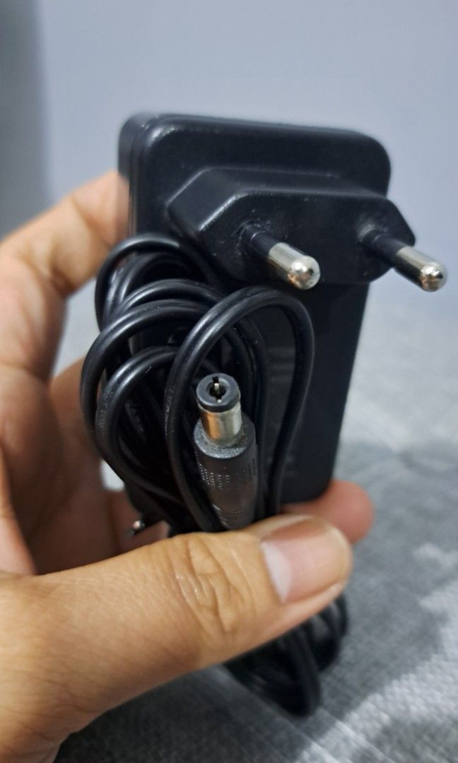 AC/DC adaptor (Category: Electrical, Adaptors & Sockets) located in Quezon City. Submitted by kirstenbella (Listing ID 1390153013, Image 1). Description: AC/DC adaptor *​Model: ZL-PW024001L1202000EU01 *​Input: 100-240V, 50/60Hz, 0.8A Max *​Output: 12.0V, 2000mA (2A) *​Plug Type: European (two-round pins) *​Connector: A cylindrical (barrel) plug *Excellent working condition -This is heavy duty, Not a light version 📞 You may reach me through: Text
