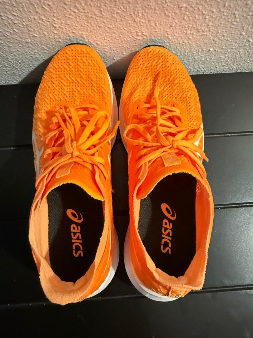 Asics Magic Speed Running Shoes - US 7.5 (24.5cm) (Category: Sneakers) located in Singapore. Submitted by fussfreedealwjamie (Listing ID 1390035730, Image 3). Description: Bought the wrong size for my daughter so selling. Only worn once, conditions of the shoes are as good as new. - Asics Magic Speed running shoes - Excellent condition - Bright orange color - US size 7.5 - Minimal wear on soles (see photos) - Suitable for running and casual wear.