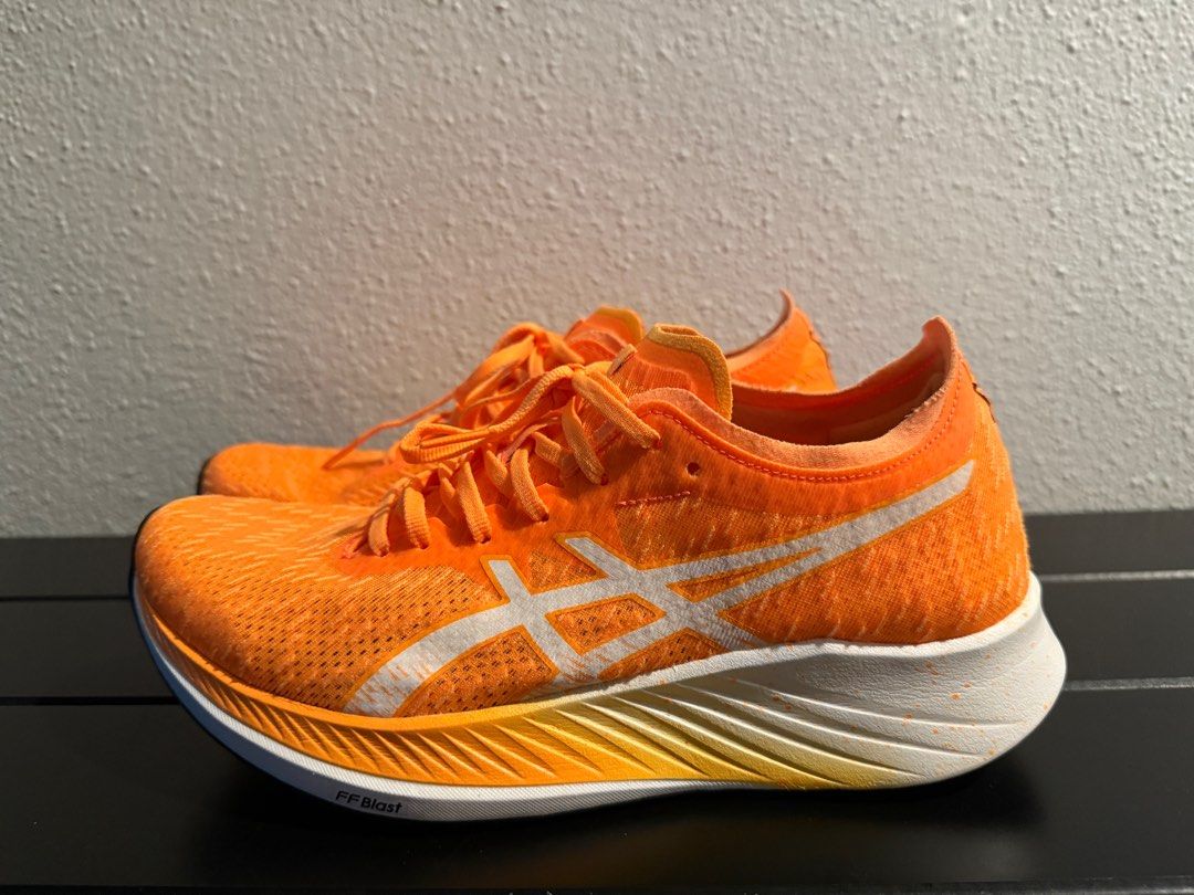 Asics Magic Speed Running Shoes - US 7.5 (24.5cm) (Category: Sneakers) located in Singapore. Submitted by fussfreedealwjamie (Listing ID 1390035730, Image 2). Description: Bought the wrong size for my daughter so selling. Only worn once, conditions of the shoes are as good as new. - Asics Magic Speed running shoes - Excellent condition - Bright orange color - US size 7.5 - Minimal wear on soles (see photos) - Suitable for running and casual wear.