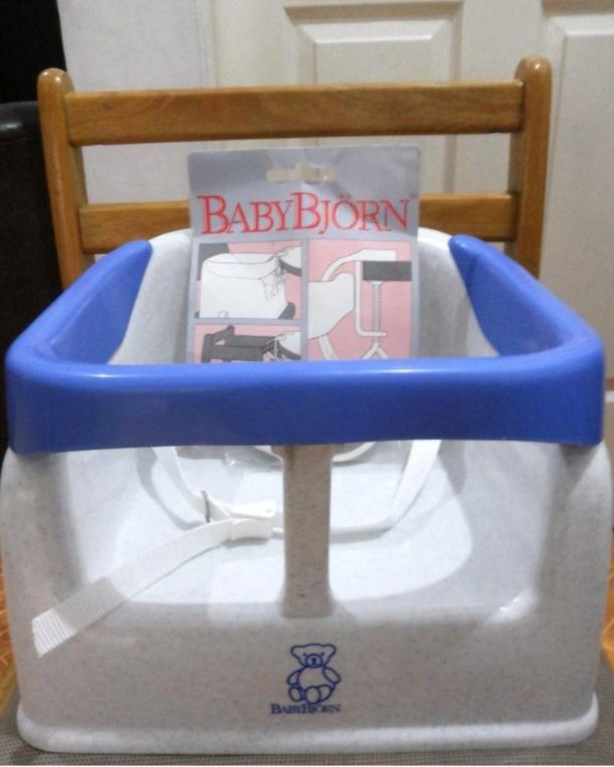 BabyBjorn Safety Booster Dining Seat (Category: Baby High Chairs) located in Quezon City. Submitted by kirstenbella (Listing ID 1390069684, Image 3). Description: Baby Bjorn Safety chair and Booster Seat >imported from UK >brand new condition never used >Soft design for comfort and easy cleaning >BabyBjorn Safety Seat converts into BabyBjorn Booster Seat by removing the safety bar >Rubber feet keep the seat in place on the chair >Elevated to keep