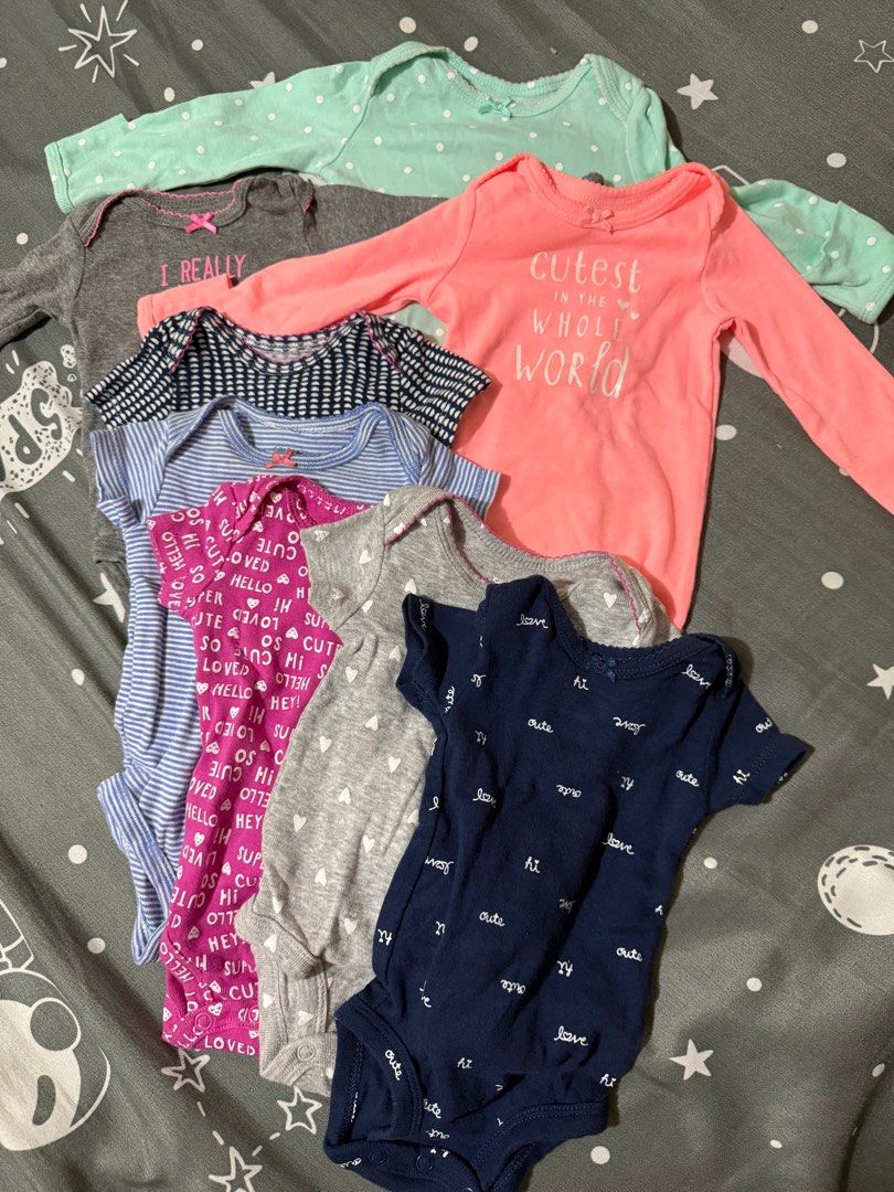 CARTERS ONESIES NB (Category: Babies & Kids Fashion) located in Mandaluyong City. Submitted by ekaadoll (Listing ID 1390041965, Image 1). Description: Take all 8pcs carters onesie and long sleeves All good condition No stain NEWBORN SIZE.