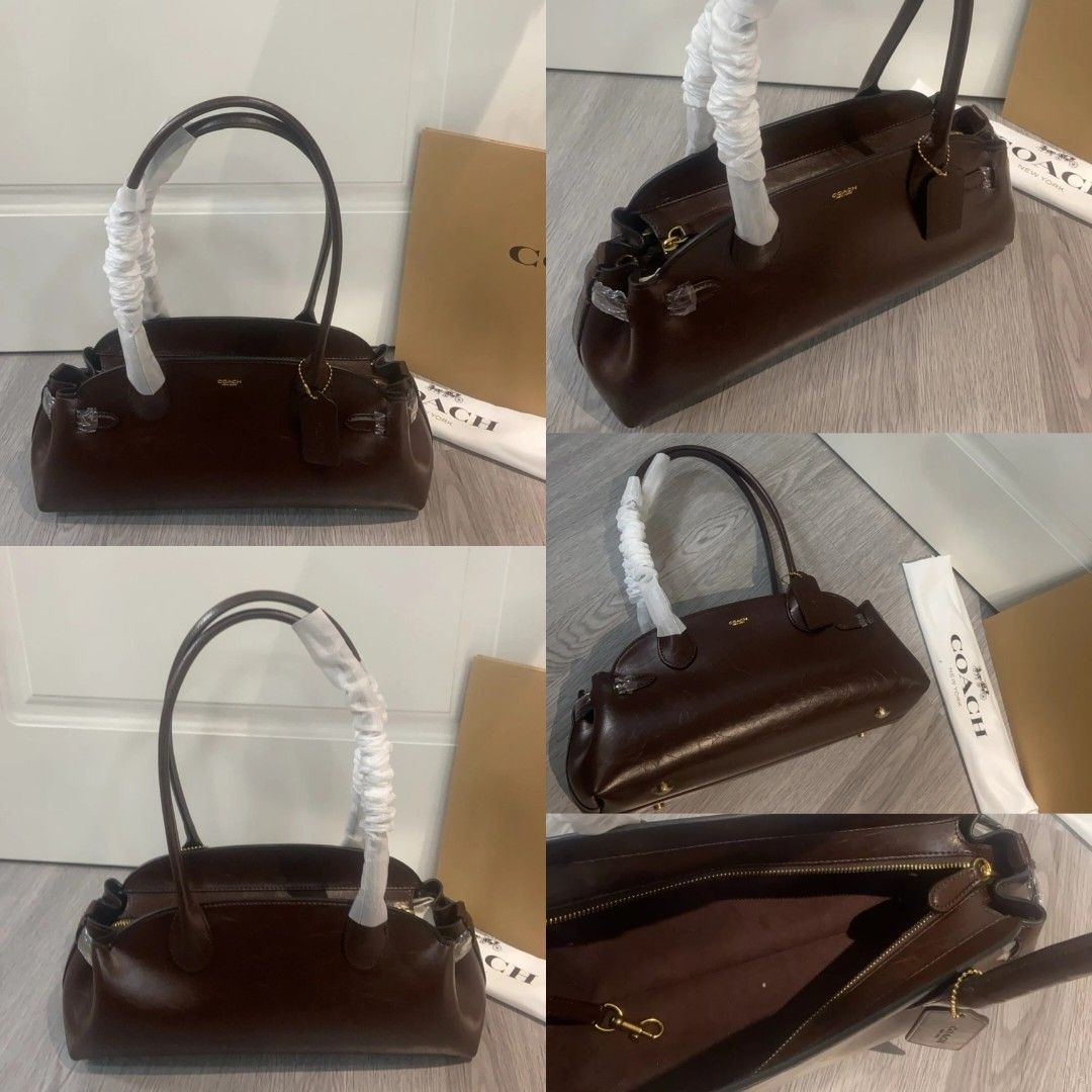 Coach Empire Carryall Bag 34 (Category: Shoulder Bags) located in Manila. Submitted by stacey_lopez922 (Listing ID 1390152803, Image 3). Description: Coach Empire Carryall Bag 34 (With dustbag and paperbag) - 13.5"L x 6.25"H x 4.75"W - Glazed leather - Fabric lining - Inside lanyard with dogleash clip - Inside multifunction pocket - Zip-top closure - Four protective feet at base.