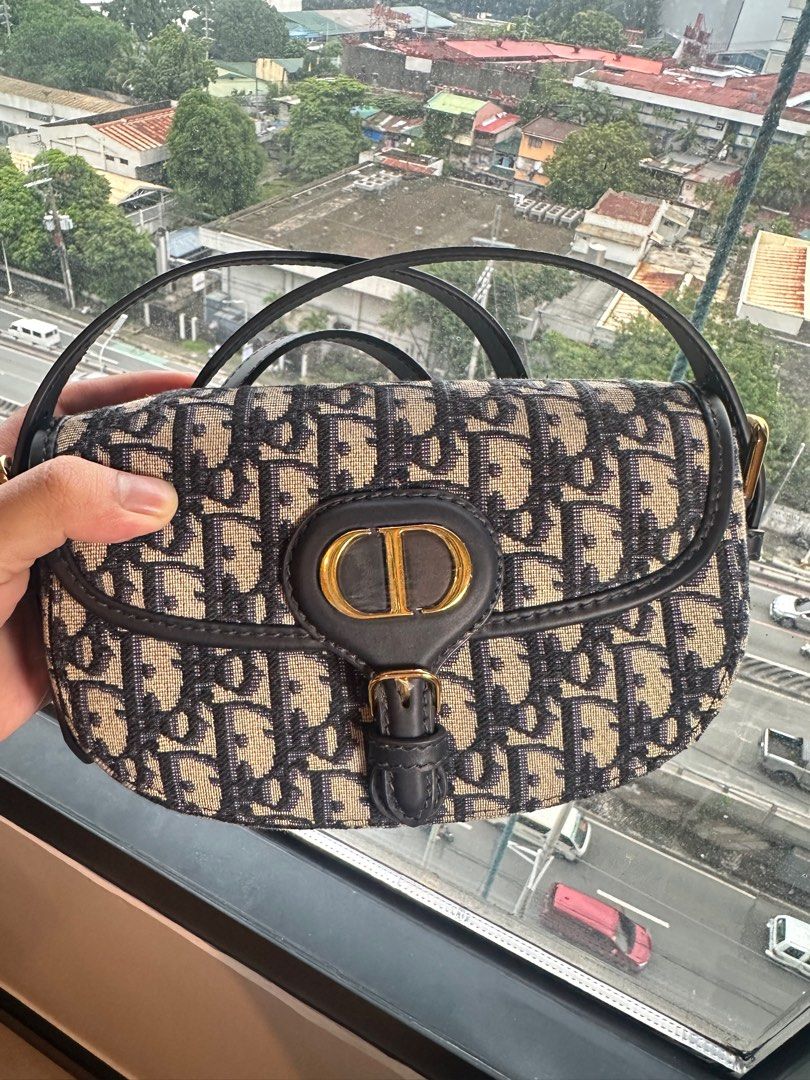 Dior Bobby East-West Bag (Category: Luxury Bags & Wallets) located in Taguig. Submitted by jthnl (Listing ID 1390117957, Image 2). Description: Dimensions: 21 x 12 x 5.1 cm / 8.5 x 4.5 x 2 inches (Length x Height x Width) Strap length: 90 – 110 cm / 35.5 – 43.5 inches Drop length: 41 – 51 cm / 16 – 20 inches Weight: 300 g / 10.5 ounces.