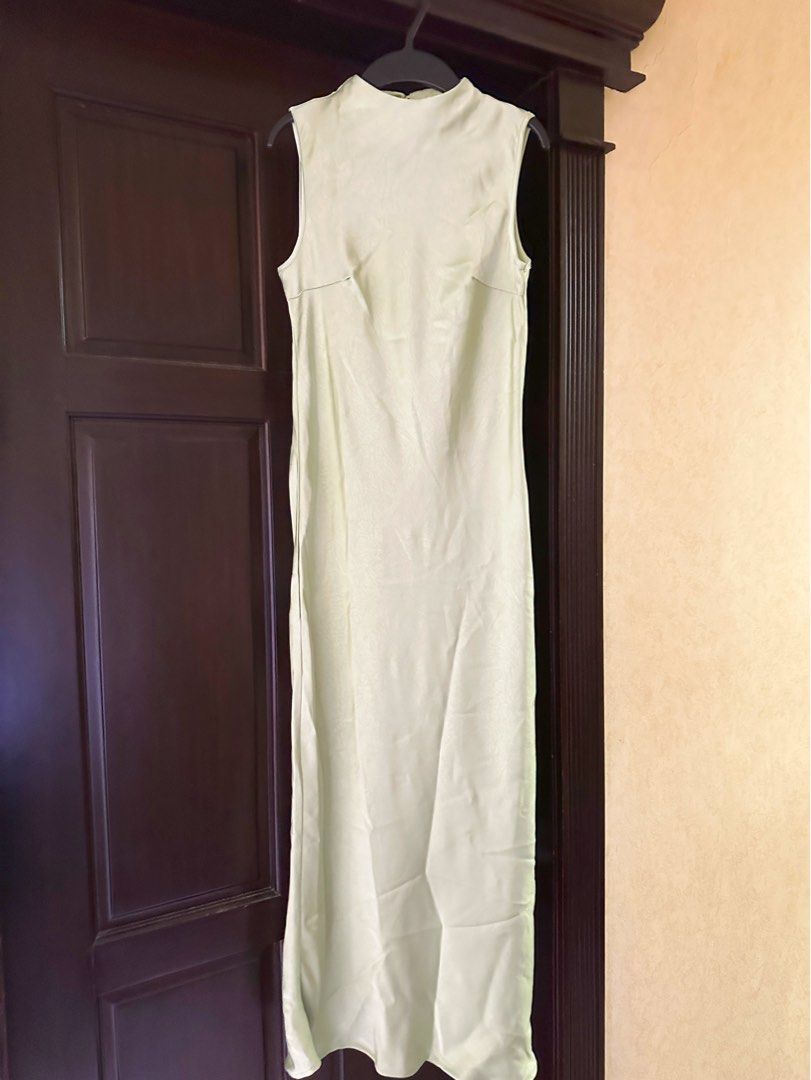 ELEGANT SATIN DRESS (Category: Dresses) located in Quezon City. Submitted by shopmythiings (Listing ID 1390217896, Image 3). Description: - beautiful satin - low side slit detail - frog button back closure Color on last photo is different cause of lighting only.