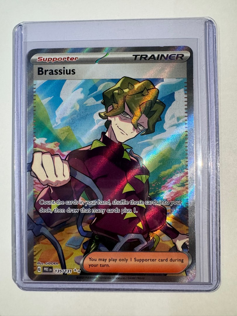 English TCG Brassius Prismatic Evolutions 135/131, Hobbies & Toys, Toys &  Games on Carousell