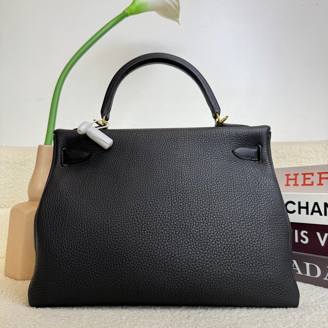 Hermes Kelly 32 Togo Black (Category: Luxury Bags & Wallets) located in Manila. Submitted by cjv.luxury (Listing ID 1390051142, Image 3). Description: CJV- 34041 Inclusions: Dr.Runway, Dustbag, Strap, Lockset ✅ All items are available for 3 months layaway ✅ For cash buyers, items are negotiable. Just shoot your offer ✅ Trades are welcome, you can bring other luxury bags/items that you wish to sell and we can convert it to store credit. 💯 We are 