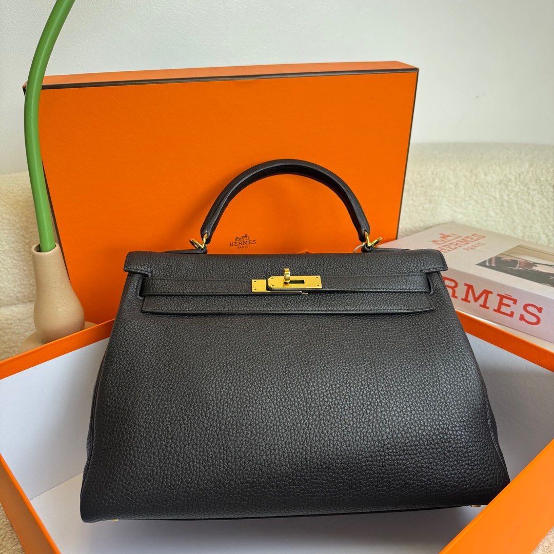 Hermes Kelly 32 Togo Black (Category: Luxury Bags & Wallets) located in Manila. Submitted by cjv.luxury (Listing ID 1390051142, Image 1). Description: CJV- 34041 Inclusions: Dr.Runway, Dustbag, Strap, Lockset ✅ All items are available for 3 months layaway ✅ For cash buyers, items are negotiable. Just shoot your offer ✅ Trades are welcome, you can bring other luxury bags/items that you wish to sell and we can convert it to store credit. 💯 We are 