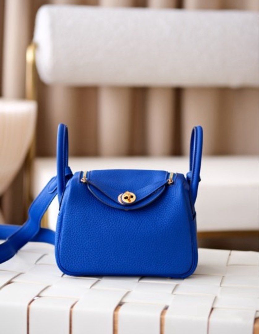 Hermes Mini Lindy 100% authentic (Category: Luxury Bags & Wallets) located in Quezon City. Submitted by caryscornermnl (Listing ID 1390204173, Image 1). Description: Hermes Mini Lindy Royal Blue Ghw Stamp Z (2022 purchased) 98% Like new With Bababebi certificate.
