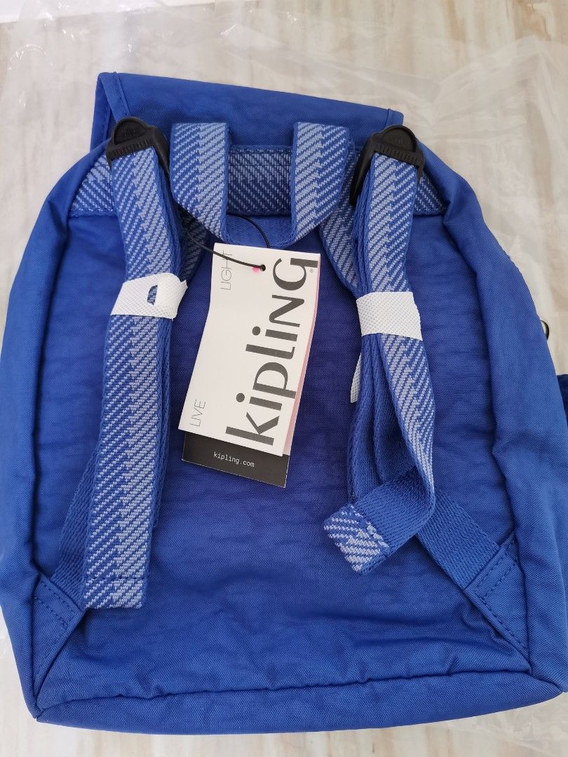 Kipling Small Backpack Bag (Category: Backpacks) located in Quezon City. Submitted by prncssgrgs (Listing ID 1390110833, Image 2). Description: Kipling Navy Mist WB Lovebug U Small Backpack 📌Details: Blue, small backpack, has many pockets/compartments to put your things in while also organized, on the go backpack 📌Brand: Kipling 📌Material: 100% Polyester 📌Brand New w/ tag; only opened for pictures *Note: Color may vary depending on the lighti