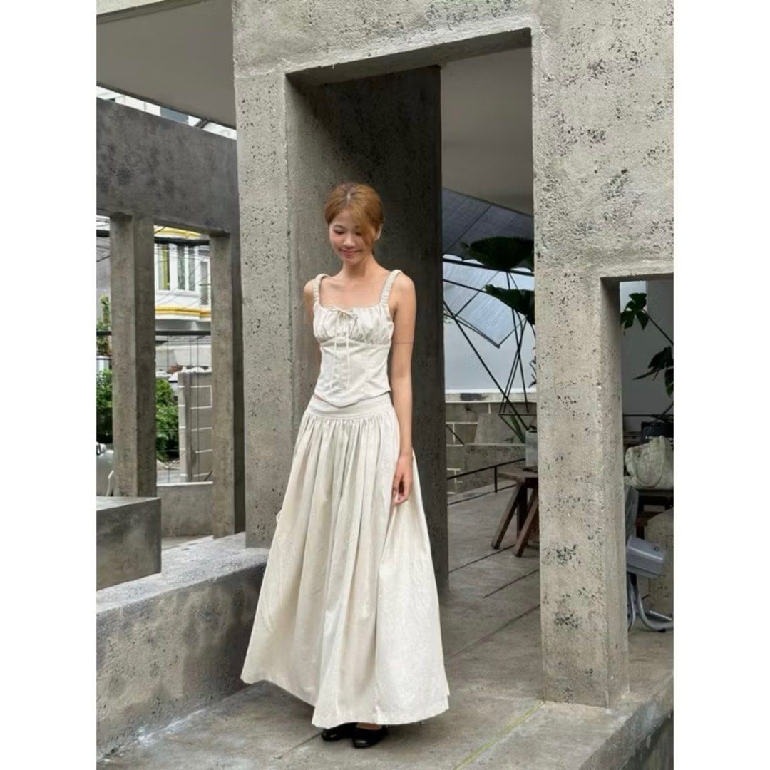 Linen Long Flared Skirt with Bow Chest (Category: Sleeveless) located in Quezon City. Submitted by qween_ (Listing ID 1390040166, Image 2). Description: Used during our Sapa trip. Material: Lightweight, breathable linen Color: Ice Cream .