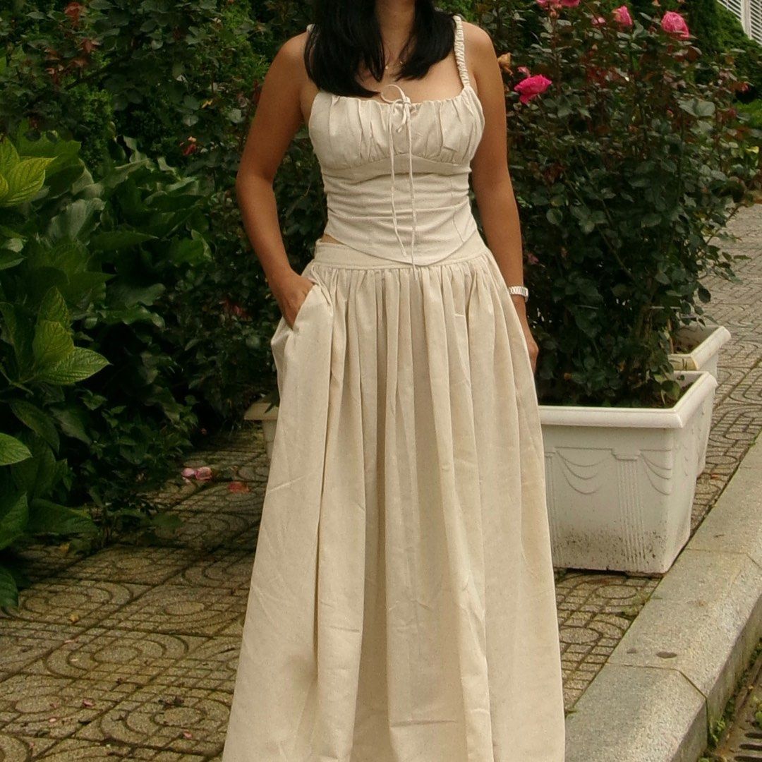 Linen Long Flared Skirt with Bow Chest (Category: Sleeveless) located in Quezon City. Submitted by qween_ (Listing ID 1390040166, Image 3). Description: Used during our Sapa trip. Material: Lightweight, breathable linen Color: Ice Cream .