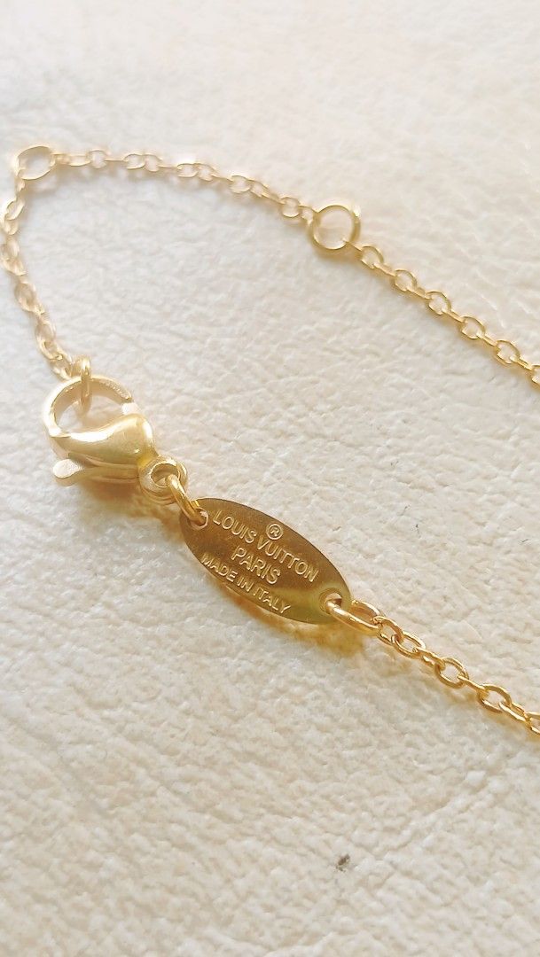 Lv necklace from japan (Category: Luxury Accessories) located in Manila. Submitted by osaze_27japanbags (Listing ID 1390037760, Image 3). Description: Lv necklace from japan no flaws with stamp,hallmark size 18inches adjustable with gift box kindly pm me.