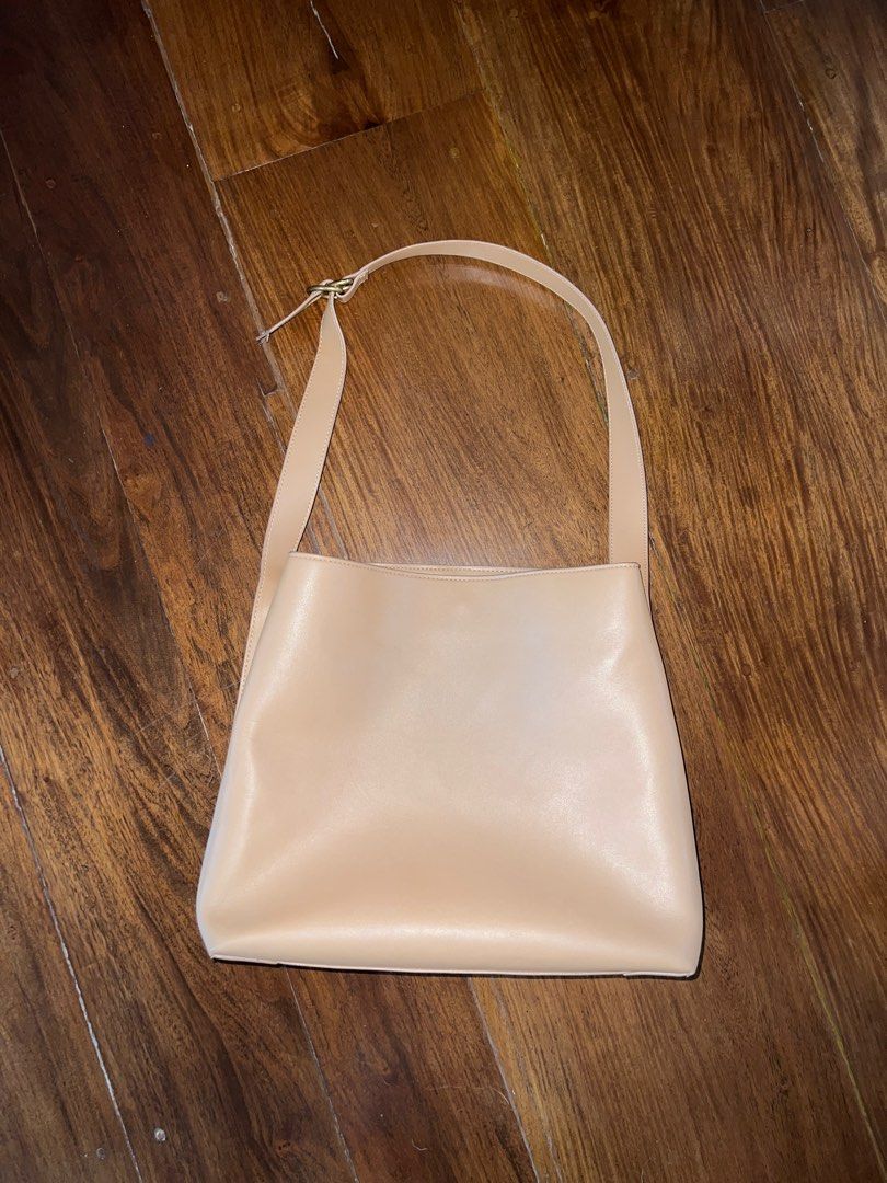 Mango Tote Bag (Category: Tote Bags) located in Quezon City. Submitted by clothesandclutter (Listing ID 1390140062, Image 1). Description: Mango Tote Bag Barely used, well taken cared of 3 main compartments Size: 11" width x 13" height (13" laptop fits exactly, but buttons won't close) Shipping fee c/o buyer.