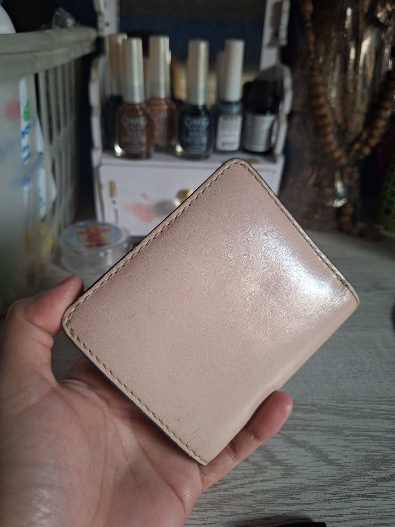 Marc by marc jacobs small wallet (Category: Luxury Bags & Wallets) located in Guagua. Submitted by naira10 (Listing ID 1390078417, Image 2). Description: selling preloved marc by marc jacobs wallet in good condition no leather tear walang bakbak slightly negotiable plus sf.
