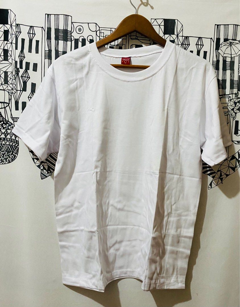 Plain white cotton T-shirt makapal (Category: Tshirts & Polo Shirts ) located in Quezon City. Submitted by hirono18 (Listing ID 1390106902, Image 1). Description: Plain white cotton T-shirt makapal.