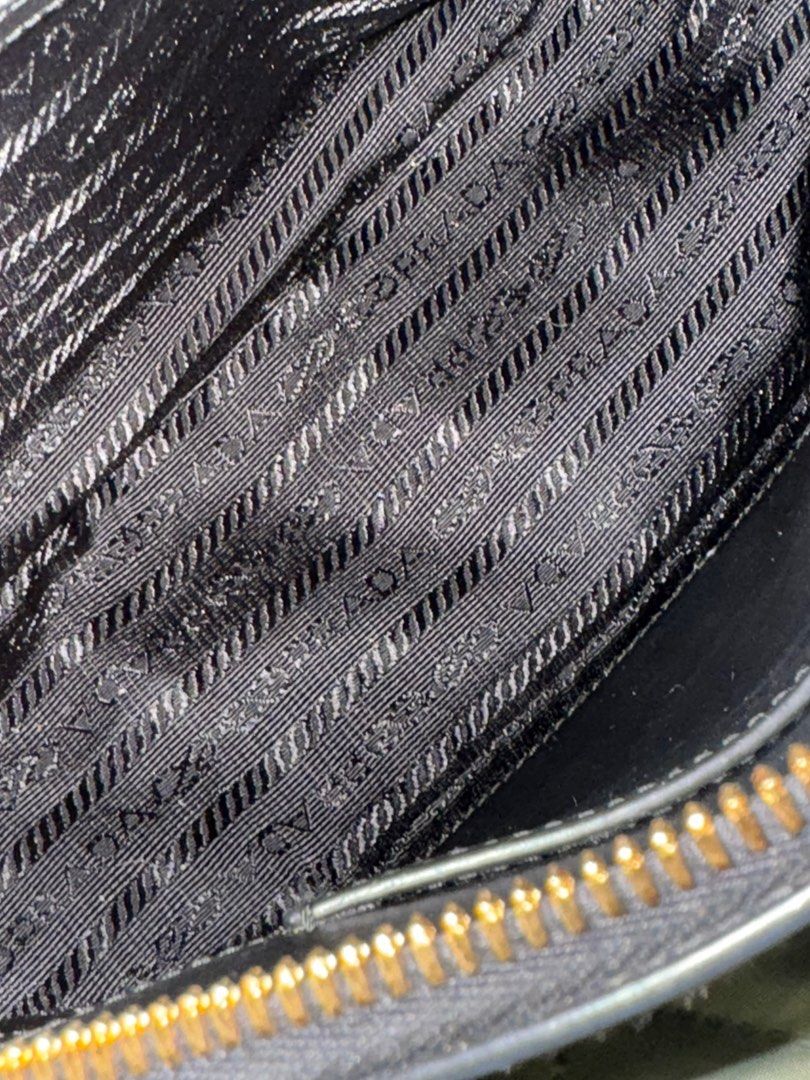 Prada Smooth Leather Black Shoulder Bag (Category: Luxury Bags & Wallets) located in Quezon City. Submitted by sayitskarla (Listing ID 1390203571, Image 3). Description: - Bought in Prada Shinsagae Main Seoul - Includes paper bag, dust bag, receipt, auth card - Smooth leather, no issues - Has built-in charm hooks or strap hooks on the side - Can send when worn upon request - MOP: BPI transfer upon meet-up .