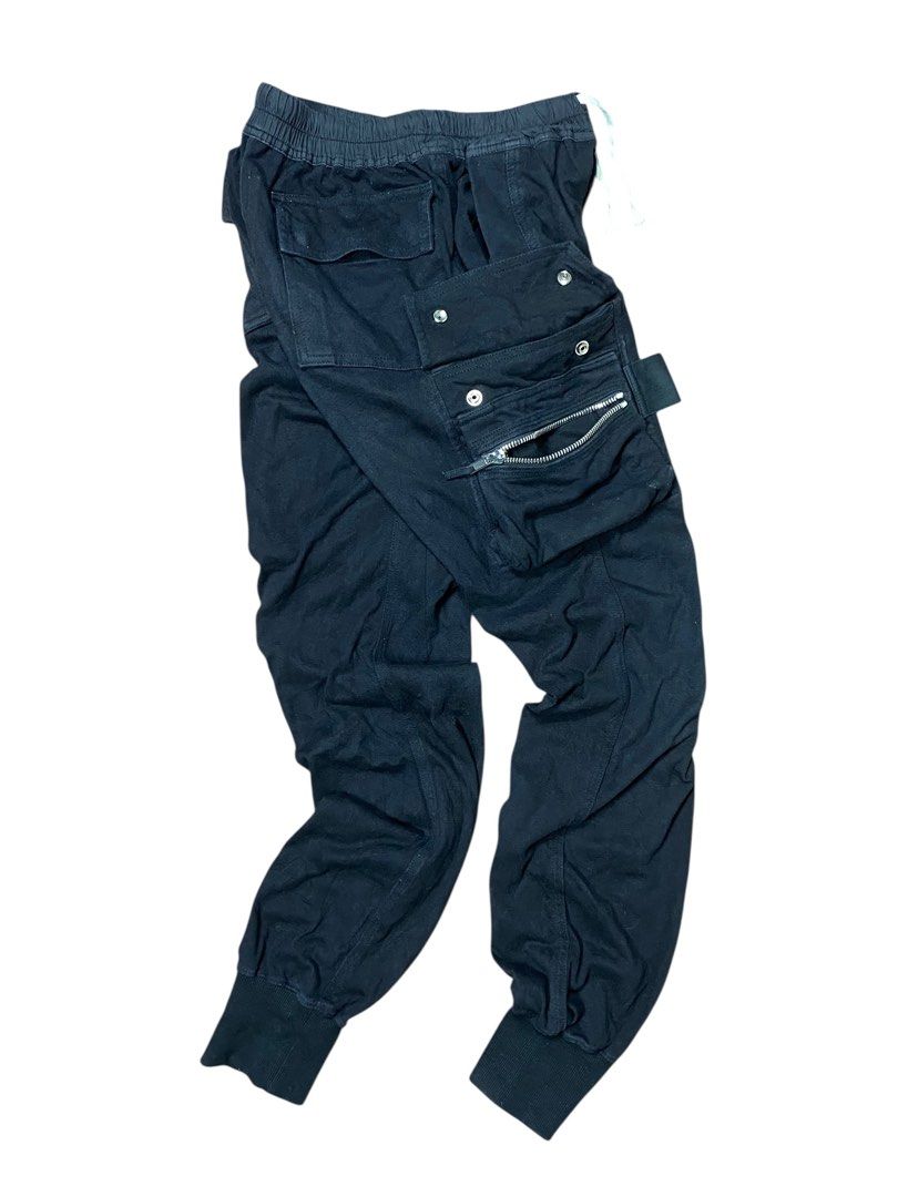 Rick Owens Walrus SS17 Cargo Pants (Category: Joggers) located in Bacolod City. Submitted by centralmarket03 (Listing ID 1390088634, Image 2). Description: Rick Owens Walrus SS17 Cargo Pants -Authentic -Measurements: *Waist: 27”-38” (Max Stretch) *Length: 44” *Leg Opening: 5”-8” (Max Stretch) -Condition: Excellent -Color rate: 9/10 (Color may vary to lighting) -Flaws: Cut laces, signs of usage.