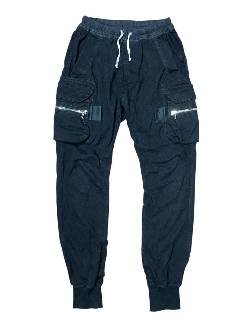 Rick Owens Walrus SS17 Cargo Pants (Category: Joggers) located in Bacolod City. Submitted by centralmarket03 (Listing ID 1390088634, Image 1). Description: Rick Owens Walrus SS17 Cargo Pants -Authentic -Measurements: *Waist: 27”-38” (Max Stretch) *Length: 44” *Leg Opening: 5”-8” (Max Stretch) -Condition: Excellent -Color rate: 9/10 (Color may vary to lighting) -Flaws: Cut laces, signs of usage.