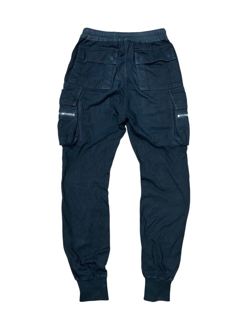 Rick Owens Walrus SS17 Cargo Pants (Category: Joggers) located in Bacolod City. Submitted by centralmarket03 (Listing ID 1390088634, Image 3). Description: Rick Owens Walrus SS17 Cargo Pants -Authentic -Measurements: *Waist: 27”-38” (Max Stretch) *Length: 44” *Leg Opening: 5”-8” (Max Stretch) -Condition: Excellent -Color rate: 9/10 (Color may vary to lighting) -Flaws: Cut laces, signs of usage.