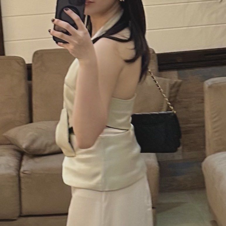 Silk satin halter top (Category: Sleeveless) located in Cainta. Submitted by ree_declutters (Listing ID 1390173486, Image 2). Description: Silk satin halter backless top, formal top Used once for an event Actual when worn posted Model measurements: Height: 5ft bust: 30inch / 76cm waist: 25.5inch / 65cm hips: 33 inch / 84cm .