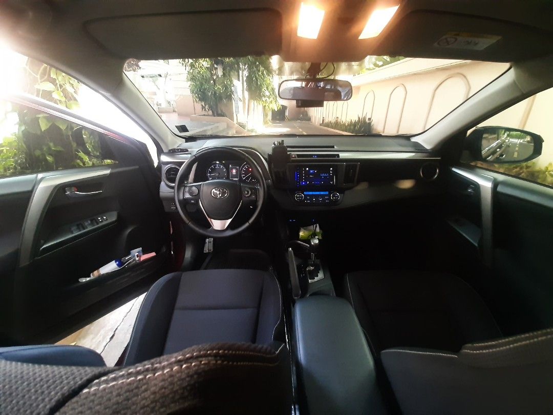 Toyota Rav4 2.5 Active Auto (Category: Used Cars) located in Manila. Submitted by patguzman046248 (Listing ID 1390058966, Image 3). Description: Toyota RAV4 2.5L Active 4x2 Model 2017 Color: Deep Mica Red Plate End 3 (Tuesday coding) Pioneer Head Unit Set Up with SubWoofer Front and Rear Cameras Blaupankt Newly serviced PMS New Battery Amaron June 2025 Original RAYS GramLights 57 DNA Made In Japan 19" wheels on Michelin Latitude Sport 255/50/19. 